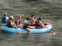 A group of rafters, none with helmets, one without even a PFD! - Lower Nolichucky, TN